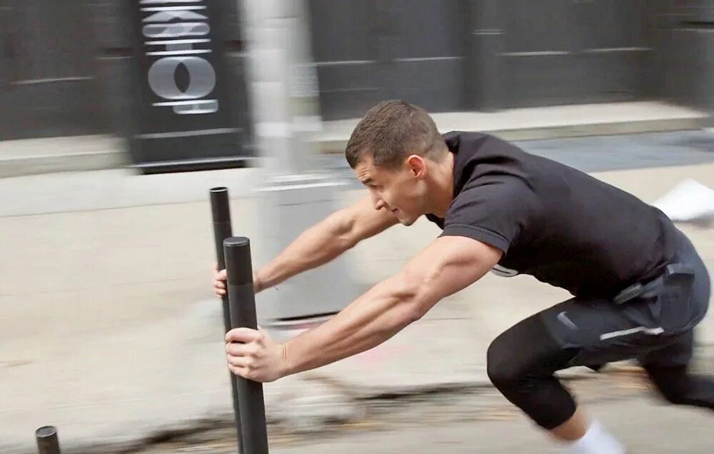 Толкание саней кроссфит. Sled Push упражнение. Heavy Sled Pushes and Pulls. Эжен Янсон pushing Weights with two Arms.