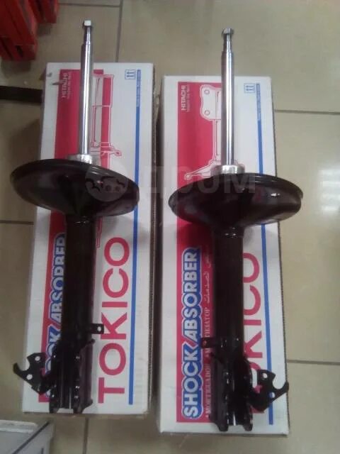 Стойка tokico b1041. B3232 ниссан тиида. Передние стойки токико. Tokico b3401. Tokico b3291.