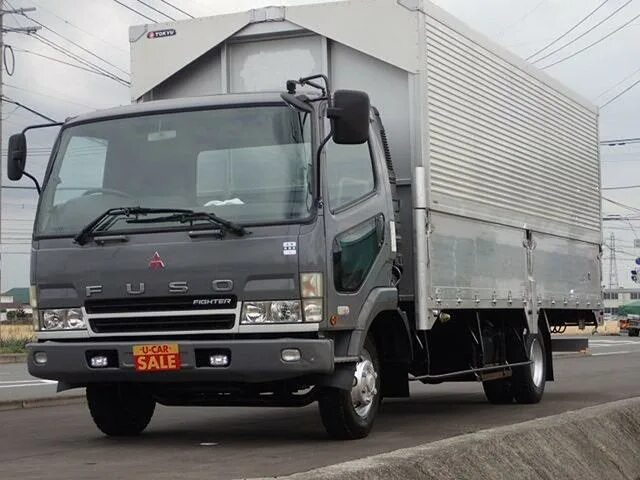 Mitsubishi Fuso Fighter 2004. Фусо Файтер 1990. Фусо Файтер широкая кабина. Фусо Файтер год 2015 фото. Мицубиси бортовой