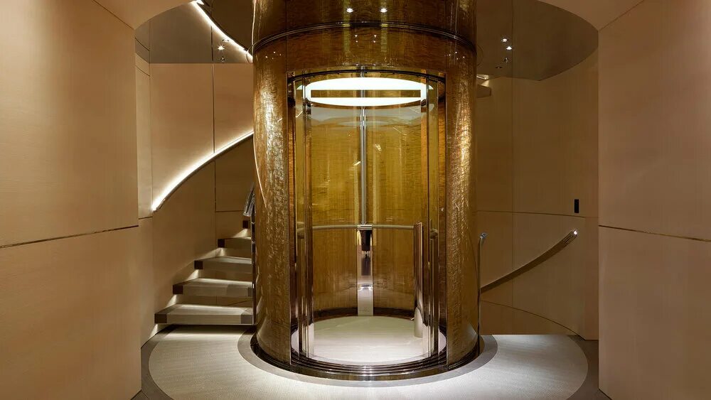 Gold lift. Круглый лифт d1000. Панорамный лифт kone. Панорамный лифт для коттеджа. Лифт круглый стеклянный.