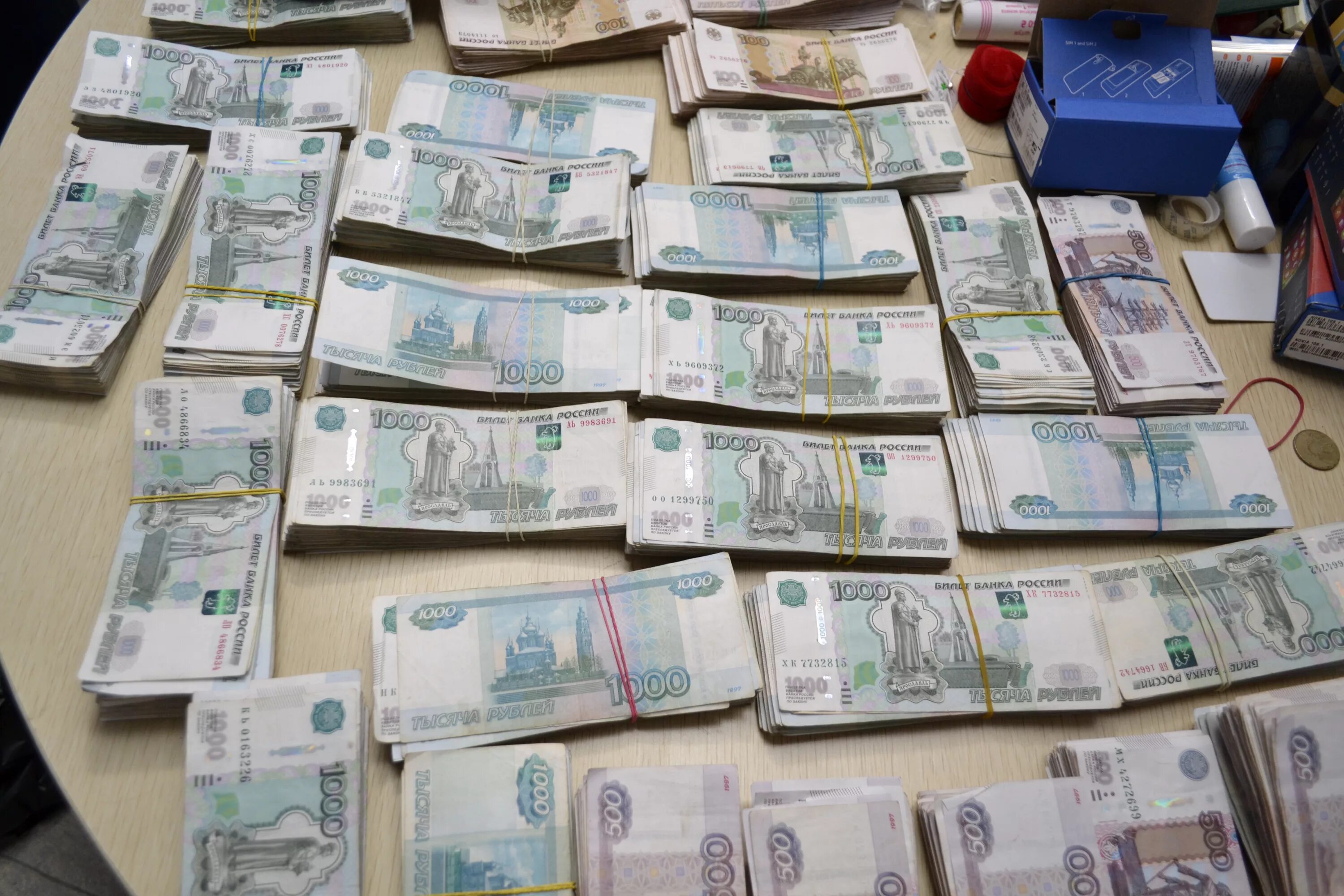 100 млн сумов в рублях