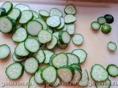 Маринованные кружочки огурцов
