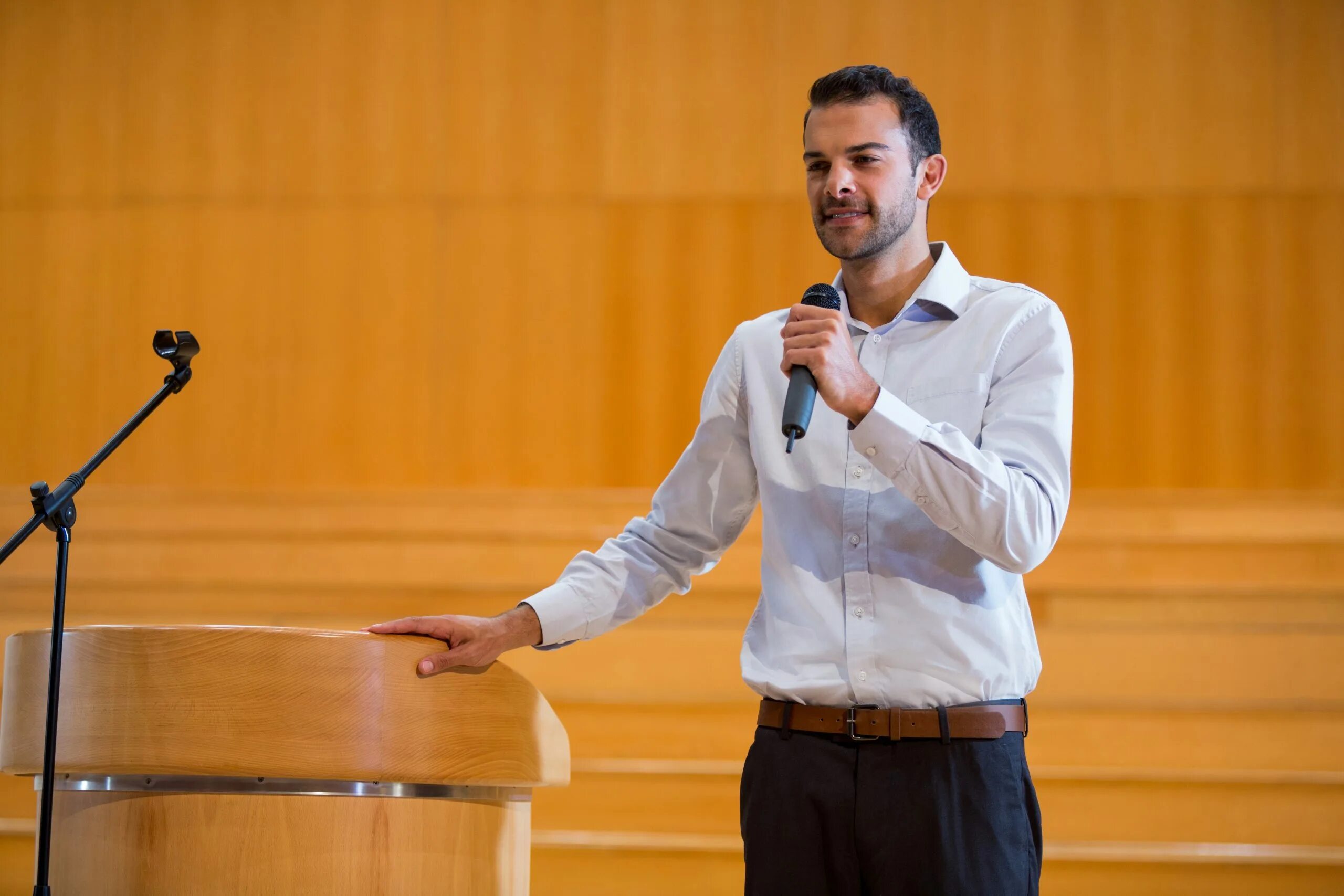 Next to speech. Giving a Speech. Speech Podium. Business Speech. Speech at the Podium of a Latin American student.