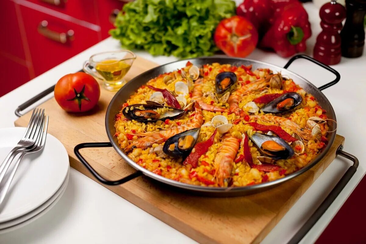 Паэлья кухня. Паэлья с лангустинами. паэлья испания. мексиканская паэлья. паэлью.