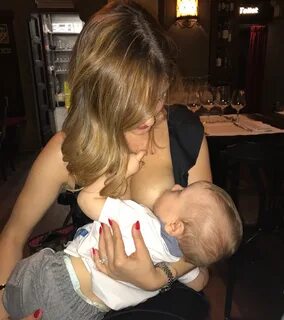 My wife breastfeeding our son, Leonardo, at Ristorante Paoli, in Florence, ...