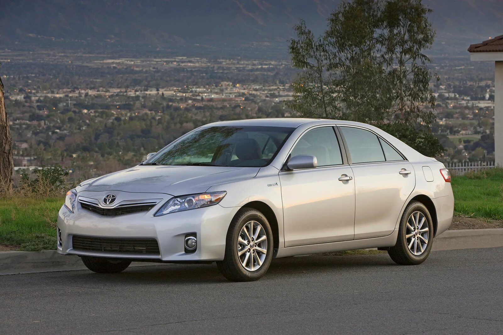 Toyota Camry Hybrid 2011. Toyota Camry 2010. Toyota Camry xv35. Camry XLE 2011.