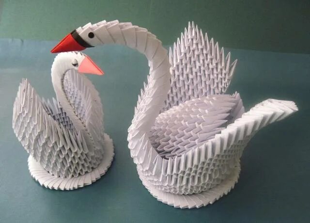 Лебеди из бумаги из модулей. Модульное оригами. Лебедь из модулей. Оригами лебедь. Лебедь из модулей оригами.
