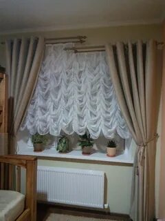 Шторы закрывают батареи