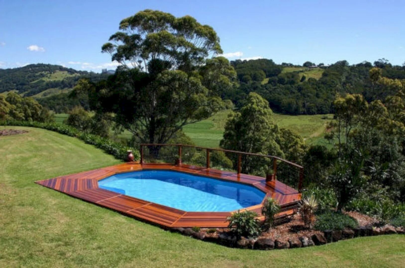 Ground Pool Deck. Pool for Farm. In-ground, larger Pool. Above ground