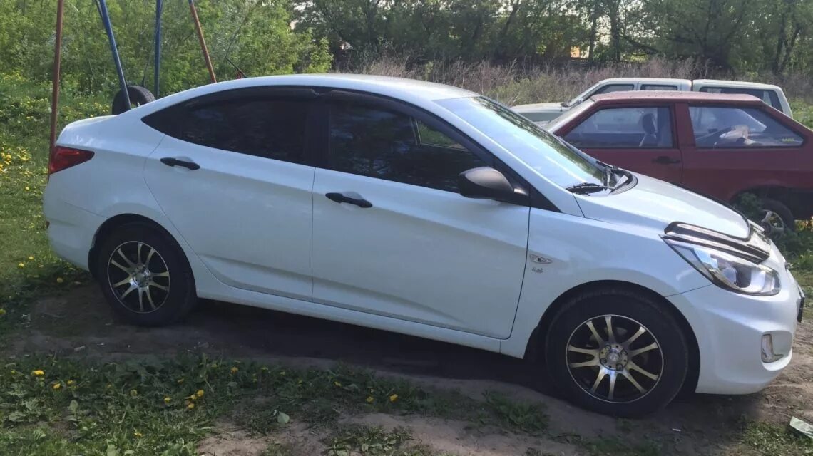 Хендай солярис купить бу в области. Хендай Солярис 2009. Hyundai Solaris 2009-2013. Hyundai Solaris 2009 года. Nz 9120775 на черном солярисе.