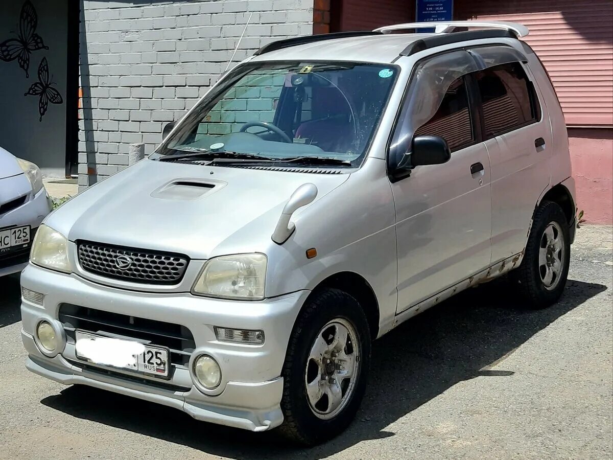 Дайхатсу териос кид купить. Машина Териос КИД. Daihatsu Terios 1 1998. Дайхатсу Териос КИД багажник. Чехлы Дайхатсу Териос КИД.