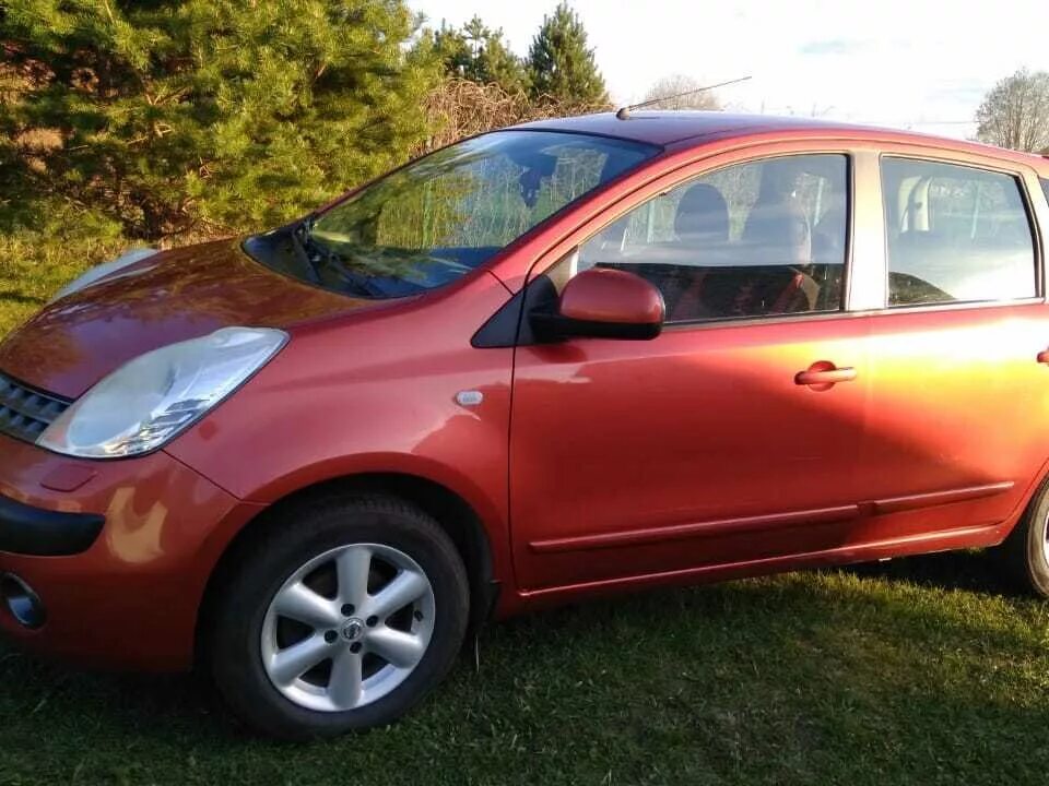 Nissan note he12. Nissan Note 2006. Ниссан ноут 2006 года. Ниссан нот 2006 оранжевый. Ниссан ноте 2008 оранжевый.