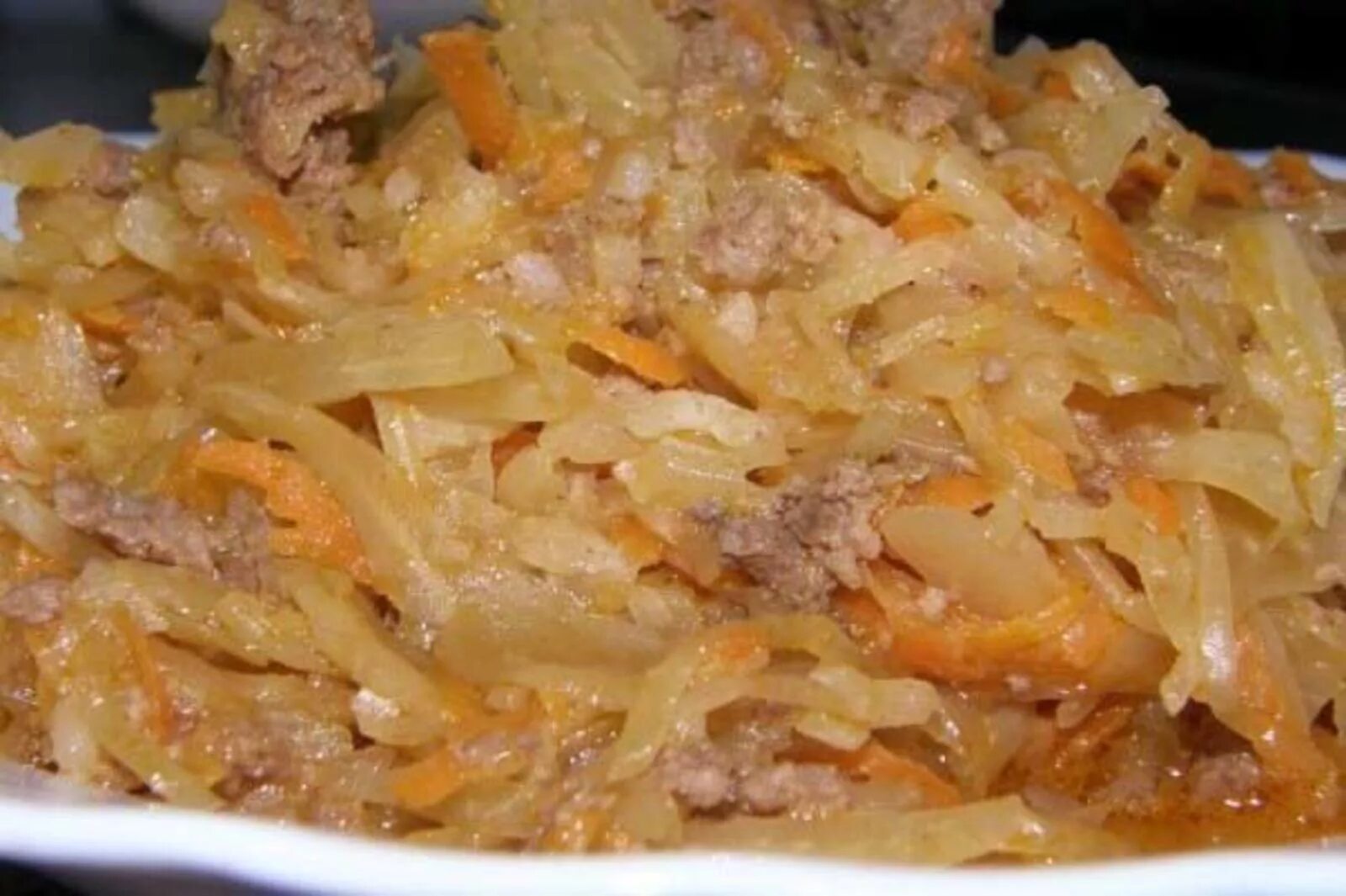 Рис с капустой и мясом в кастрюле. Ленивые голубцы с капустой рисом и мясом. ленивые голубцы с капустой и фаршем пошагово. ленивые голубцы с капустой рисом и фаршем в казане. ленивые голубцы с капустой рисом и фаршем в детском саду.