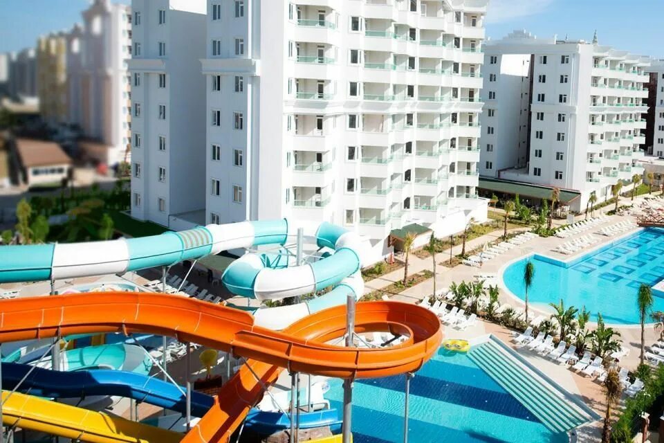 Lara family club. Lara family club. Отель ramada resort lara. Отель wyndham garden lara. Отель в турции wyndham garden lara.
