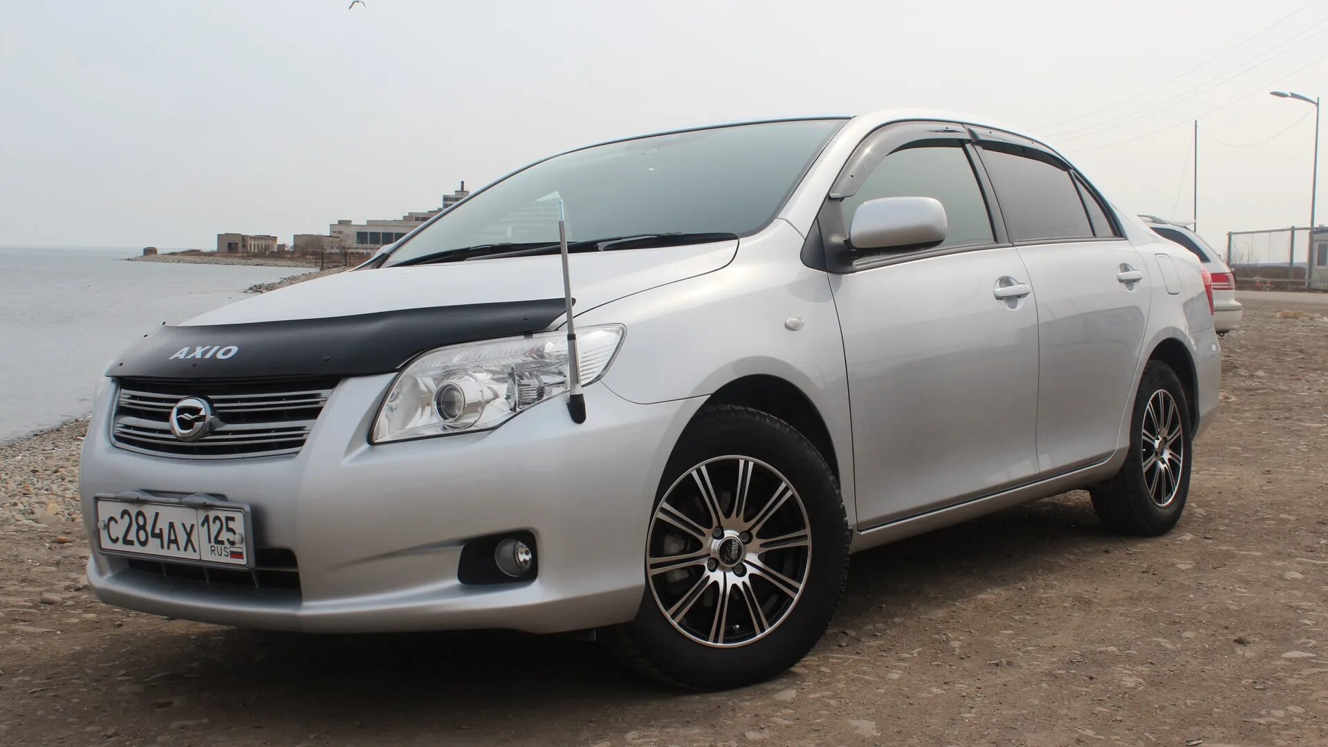 Продажа тойота королла аксио. Toyota Corolla Axio e140. Toyota Toyota Axio 2008. Тайота Карола Аксио 2007. Toyota Corolla Axio 2008.