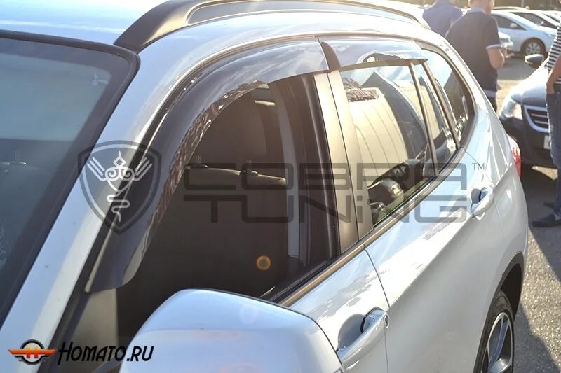 Дефлектор окон bmw x1. Heko arc. Бмв х1 с дефлекторами. Бмв х5 с дефлекторами окон. Ветровики на бмв е39.