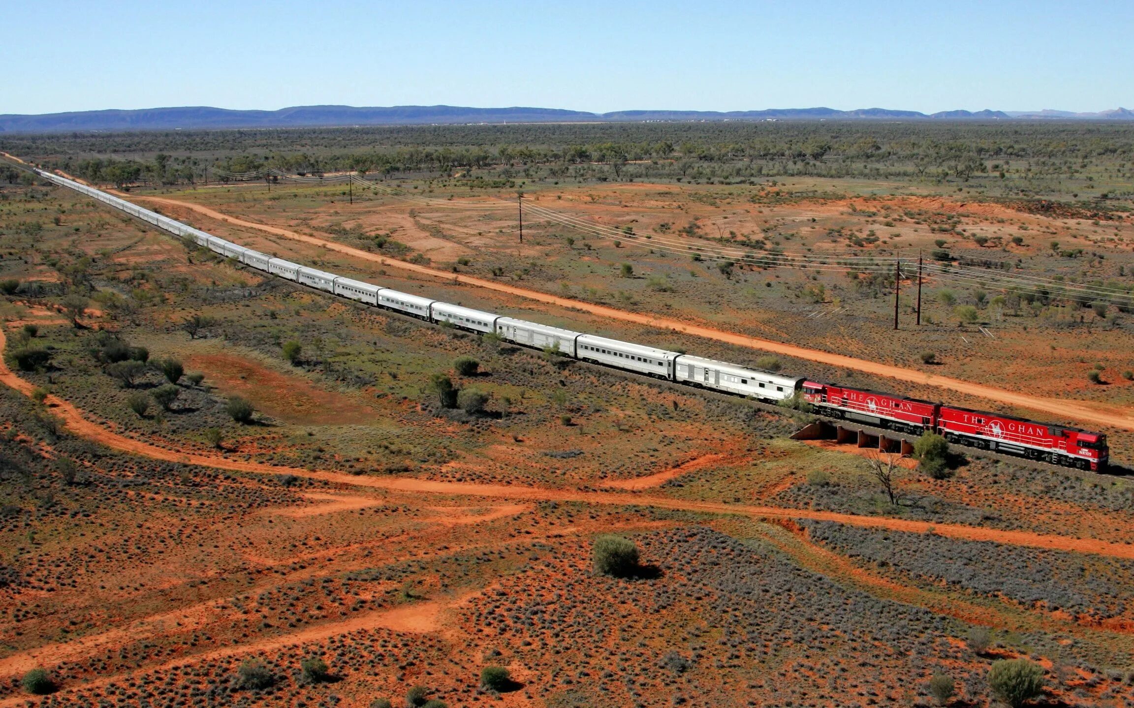 Поезд Ган Австралия the Ghan. Трансконтинентальная железная дорога Австралия. Самый длинный поезд в мире 682 вагона. Трансконтинентальная магистраль Сидней Перт. Железные дороги австралии