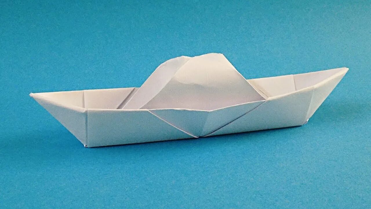 Лодка из бумаги. Оригами корабль. Бумажный катер. Моторная лодка из бумаги