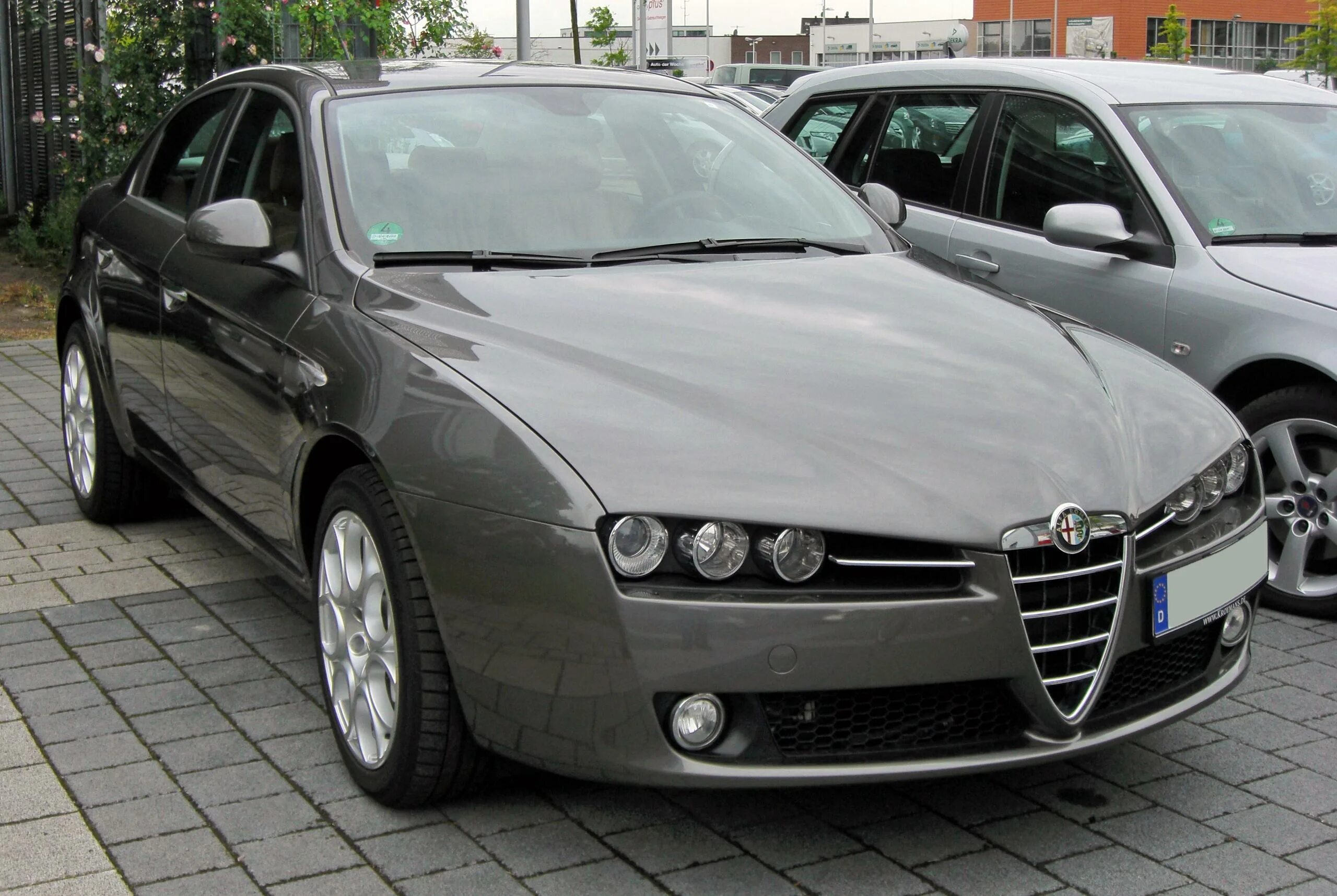 Альфа без ромео. Alfa Romeo 2009. Альфа Ромео 159. Альфа Ромео 159 2009. Alfa Romeo 159 Front.