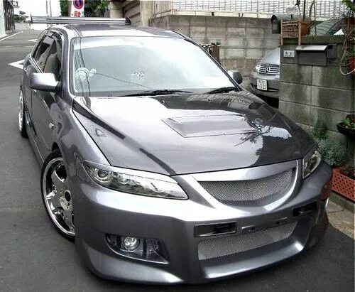 Капот мазда 6 gg. Mazda Atenza gg3s. Mazda Atenza gg3s Tuning. Mazda 6 gg капот MPS. Мазда Атенза 2003.