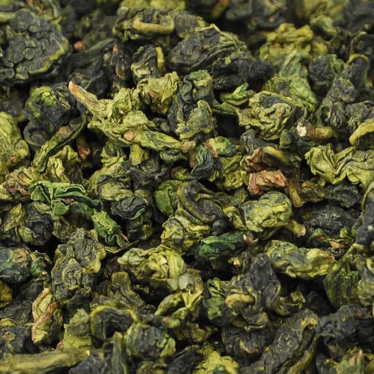 Купить хороший зеленый чай. Тегуаньинь чай зеленый. Китайский чай зеленый Тегуаньинь. Китайский зеленый чай улун. Чай сорта улун зеленый.