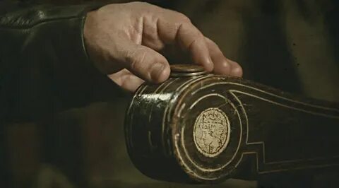 Над монетой