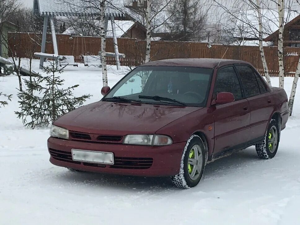 Mitsubishi 1994. Mitsubishi Lancer 1994. Митсубиси Лансер 1994. Митсубиши Лансер 1994 года. Mitsubishi Lancer 1994 года.