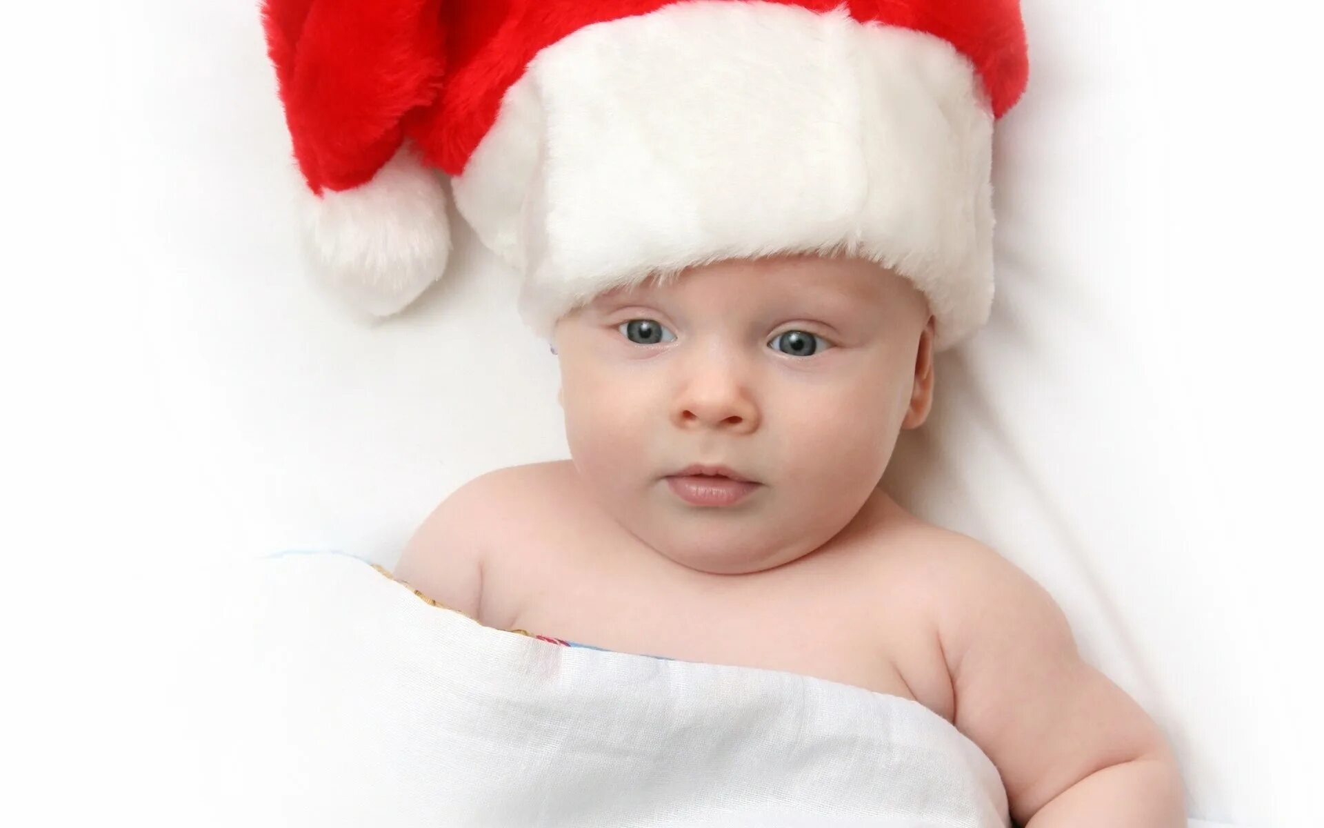 Малыши дед мороз. Ребенок в шапке Деда Мороза. Шапка для детей. Шапка "малыш". Костюм Санты малыша.