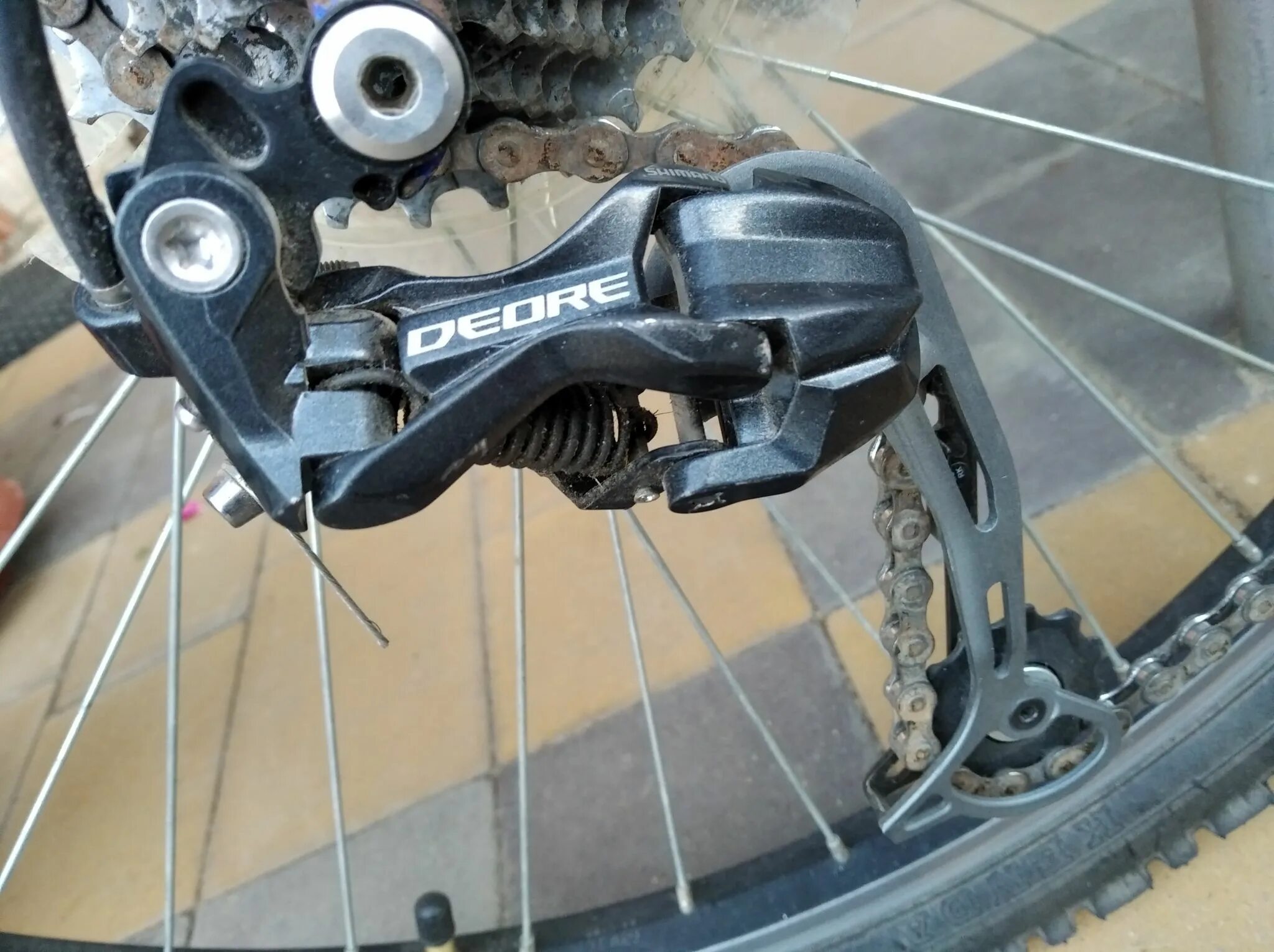 Задние скорости скоростного велосипеда. Переключатель задний Shimano Deore m592. Deore Shimano задний переключатель 592. Шимано диор задний переключатель. Shimano Deore m592 SGS Shadow.