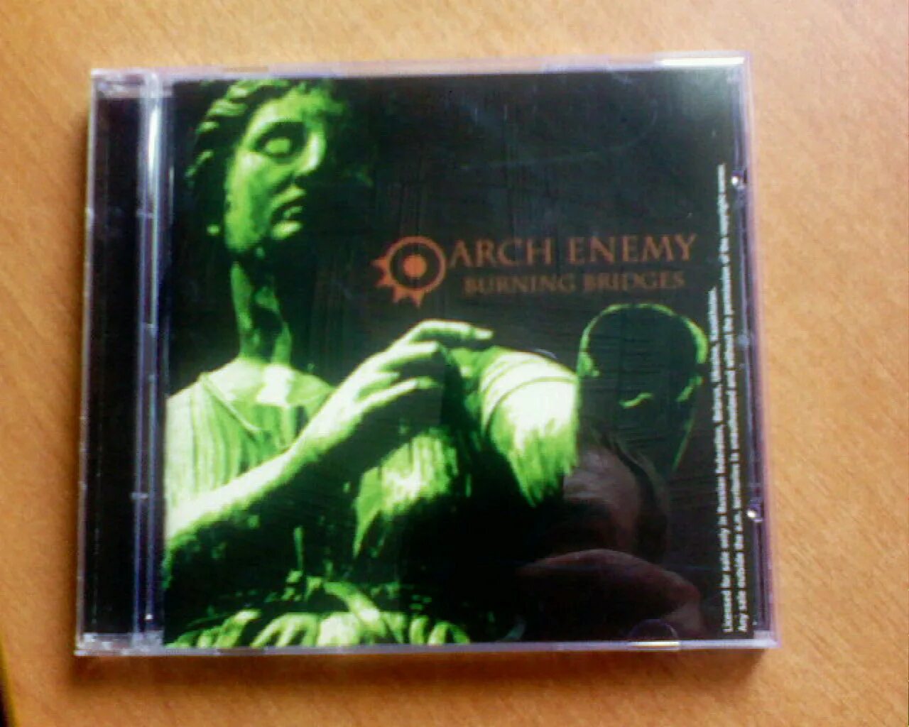 Arch enemy burning bridges обложка. Arch enemy burning bridges. Arch enemy burning. Arch enemy burning bridges 1999. Arch enemy ангела.