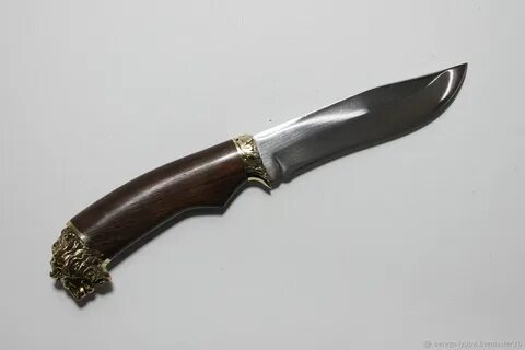Нож лев