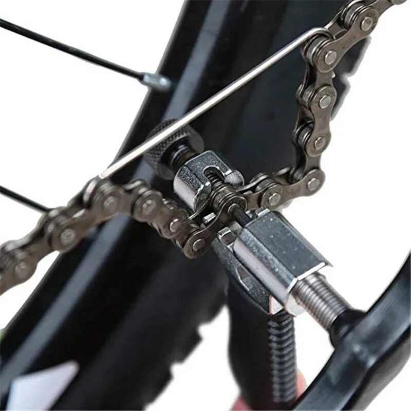 Как поменять цепь на велосипеде. Цепь велосипедная,d32770. Deemount аликуспес цепь для велосипеда. Стягиватель цепи велосипеда. Разжим для цепи велосипеда.