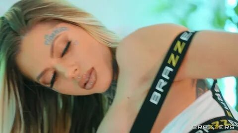 Busty tattooed babe Chantal Danielle takes a ride on a big schlong.