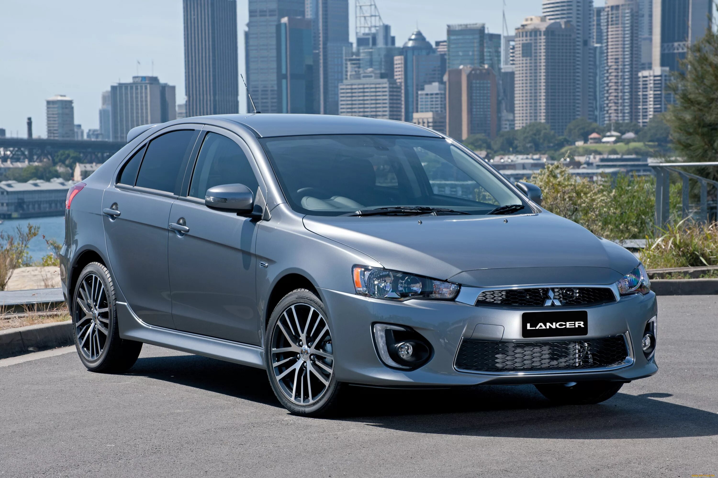 Mitsubishi lancer выпуска. Мицубиси Лансер 10 Рестайлинг. Mitsubishi Lancer 2015. Mitsubishi Lancer 15. Mitsubishi Lancer 2016.