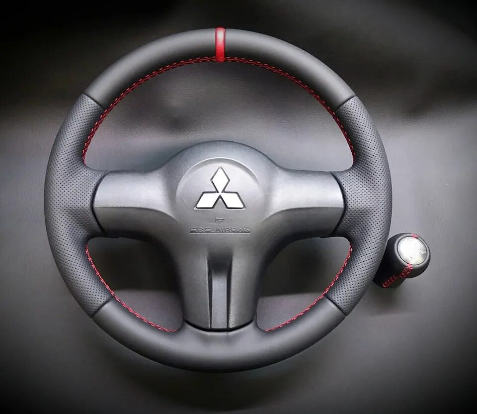 Руль от митсубиси лансер 10. Руль митсубиси. Руль мицубиси outlander xl. Митсубиси асх 2012 руль. Руль митсубиси лансер 10.