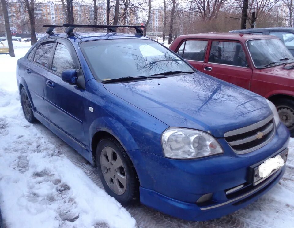 Купить лачетти свердловская область. Багажник Lux Лачетти седан. Chevrolet Lacetti седан багажник. Багажник на крышу Шевроле Лачетти седан. Рейлинги на Шевроле Лачетти седан.