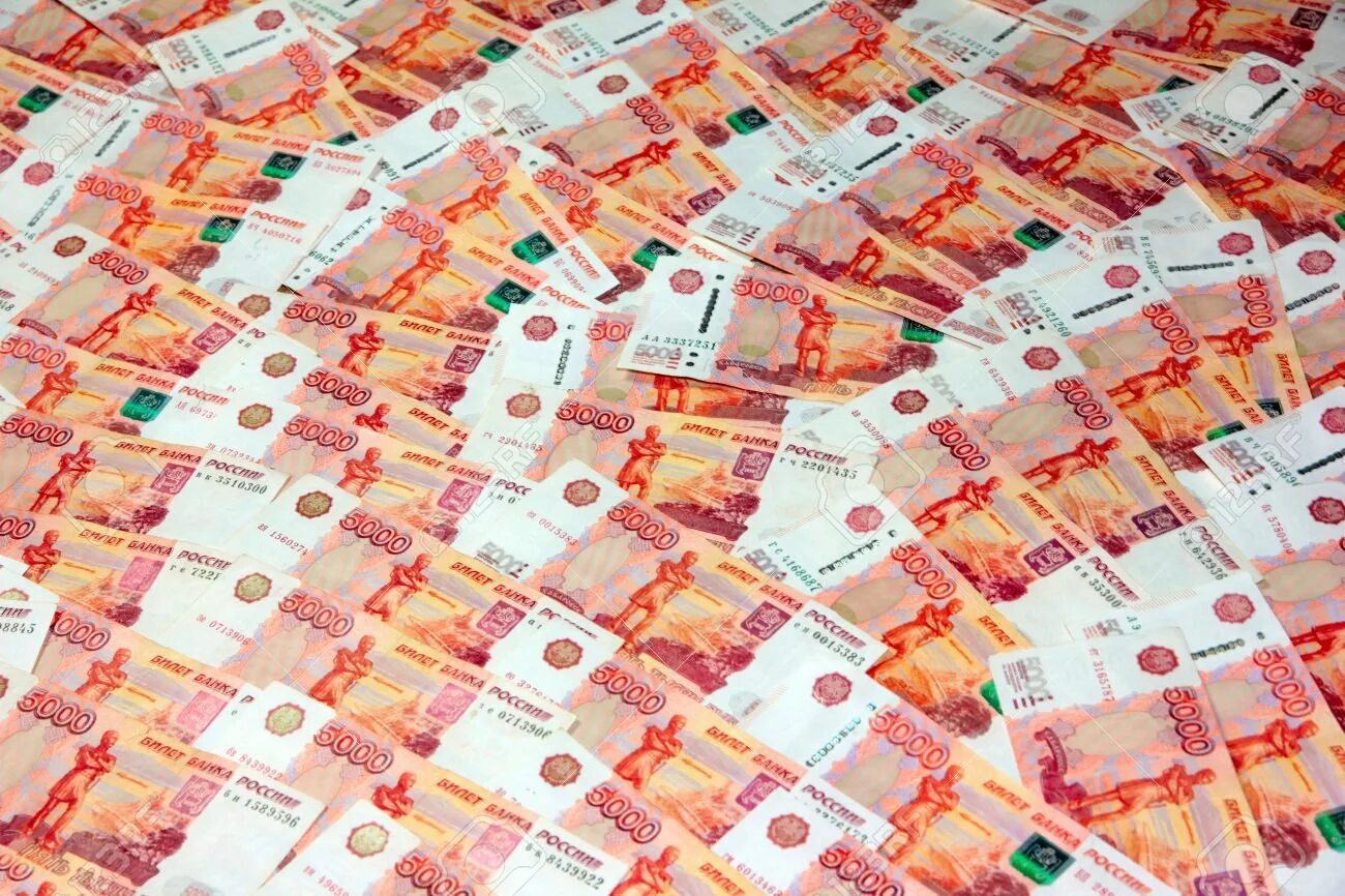 Оформить 5 тысяч. Пятитысячная купюра. деньги рубли. деньги 5000 рублей. много пятитысячных купюр.
