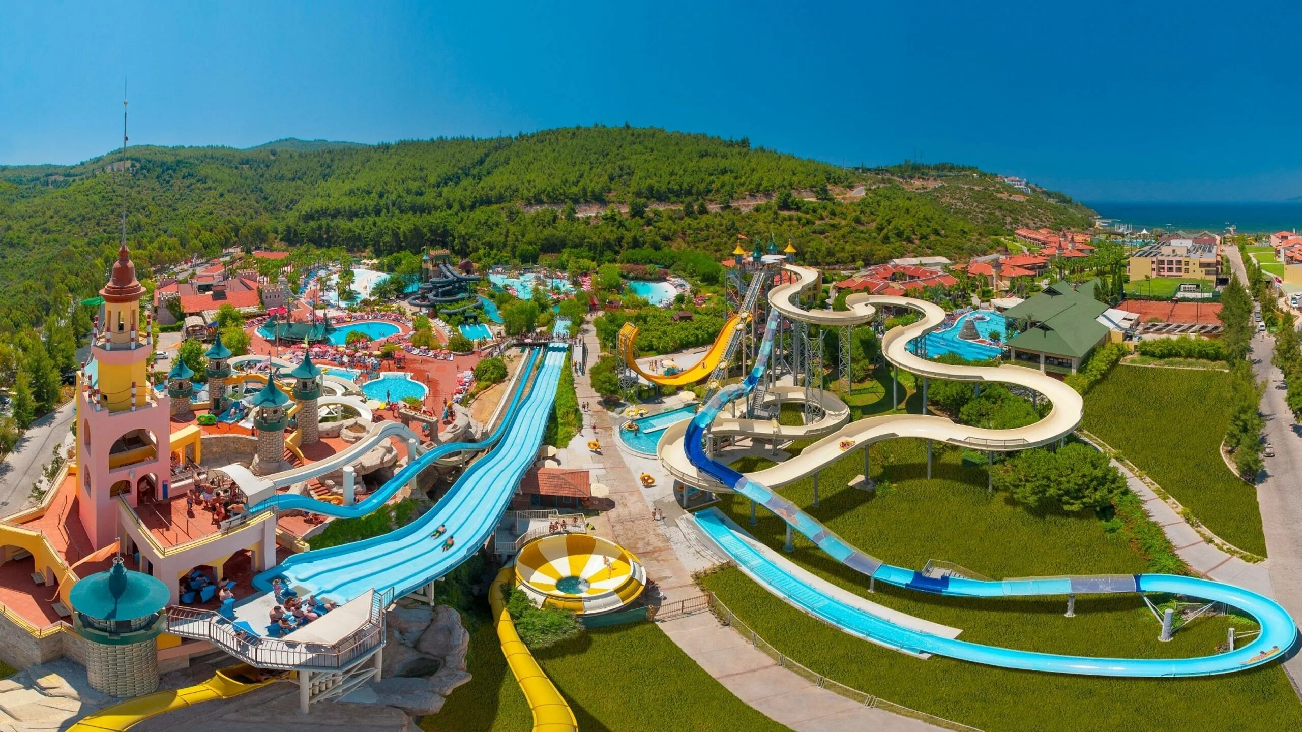Какие аквапарки в турции. Aqua fantasy aquapark 5 кушадасы. aqua fantasy hotel spa 5 турция кушадасы. aqua fantasy aquapark hotel &amp; spa 5*. аквапарк адалэнд в турции.