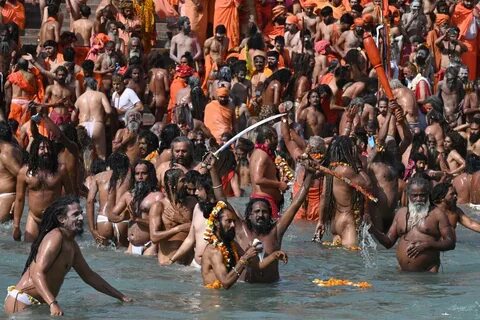 Kumbh Mela: 2.1 million pilgrims take holy dip; social distancing goes for ...