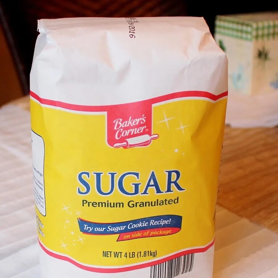 Packet of sugar. A bag of sugar. сумка сахарка. big bag of sugar.