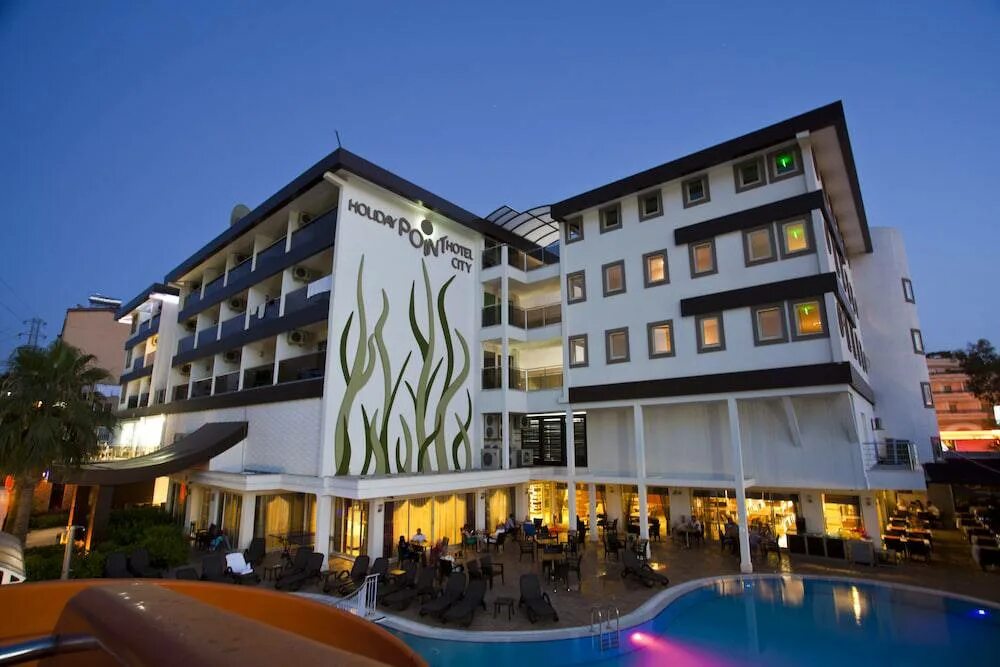 Holiday city hotel 4 турция. Сиде виладж отель турция. Дискотека отель турция. Photo holiday hotel. Сиде отель larissa beach.