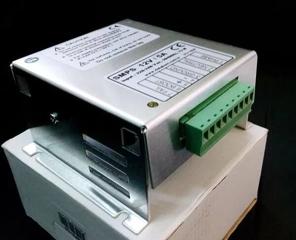 Зарядное 10 ампер. Datakom SMPS 125. Datakom SMPS-125 (12в 5а). SMPS 12v 5a. SMPS-125 зарядное устройство 12в 5а.