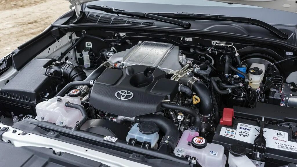 Какой двигатель стоит на тойоте. Toyota hilux мотор дизель. toyota hilux 2025 двигатель. toyota hilux 2015 о двигателе. toyota hilux 2018 2.4 двигатель.
