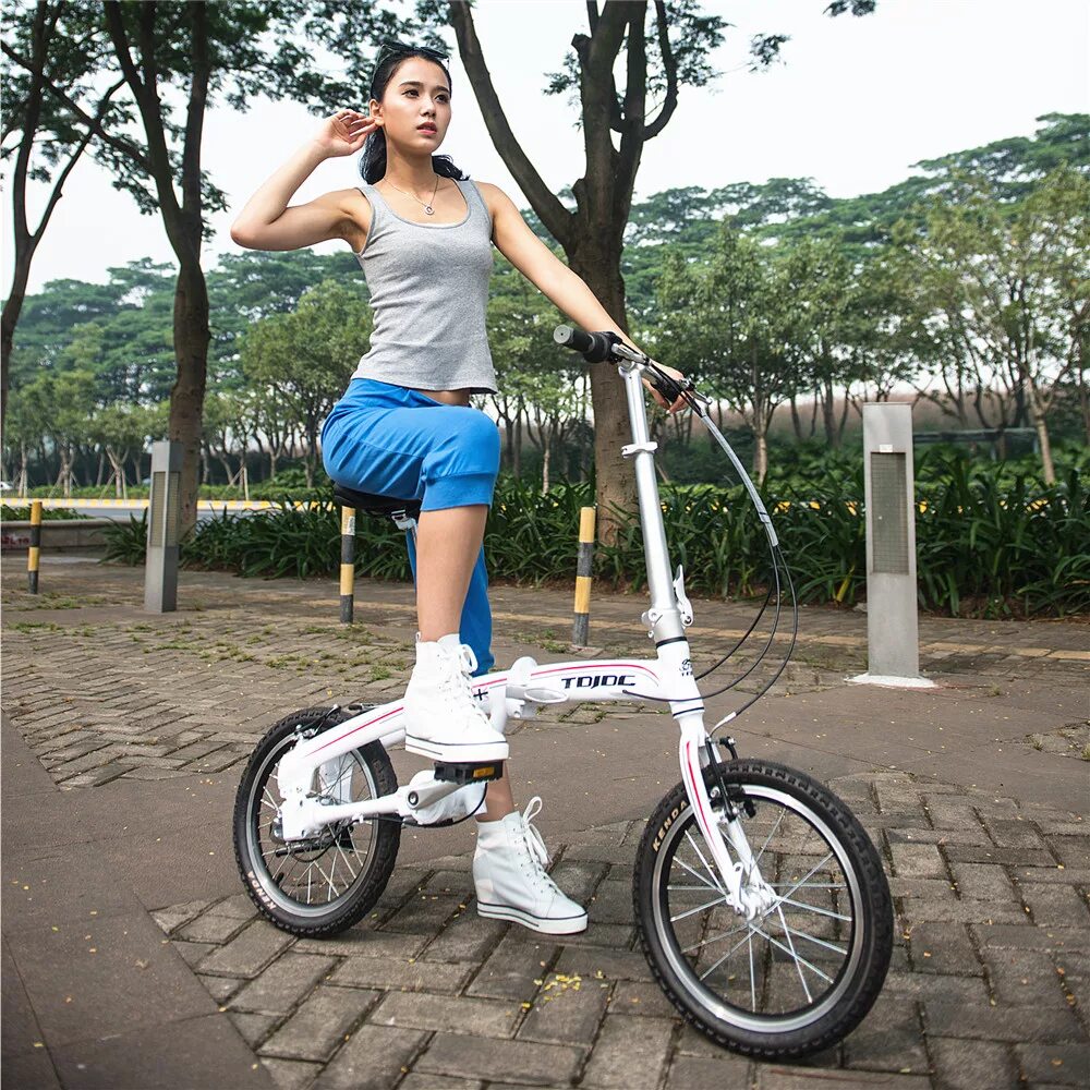 Высокий велик. Женский велосипед с маленькими колесами. Велосипед с небольшими колесами. Велик с маленькими колесами. Велосипеды с маленькими колесами для женщин.