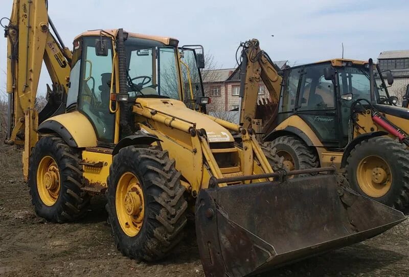 Трактора экскаватор погрузчик б у. Komatsu wb97s-2. Экскаватор-погрузчик Коматсу wb97s 2. Экскаватор-погрузчик Комацу 97s2. Коматсу погрузчик wb97s2.