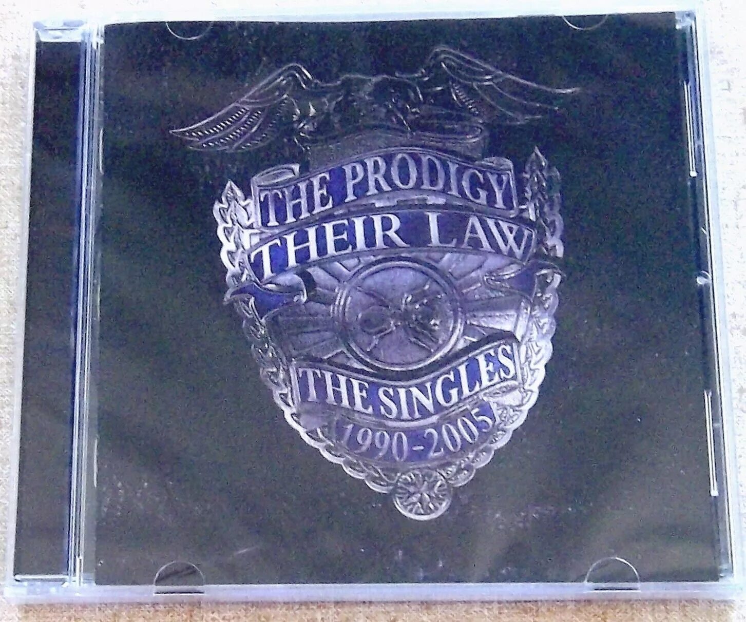 The Prodigy their Law the Singles. The Prodigy 2005 - their Law (the Singles 1990-2005). Their Law: the Singles. Their Law the Singles 1990 2005 альбом.