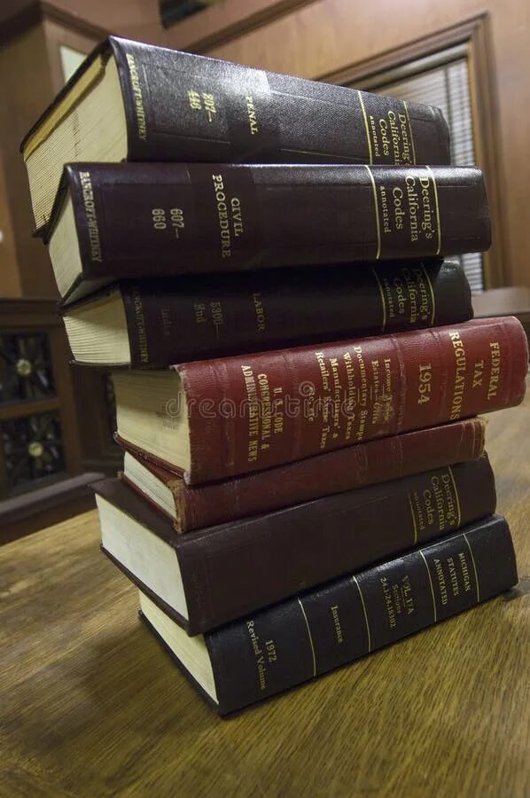 Legal books. Юридические атрибуты. Правовые книги. Юридические книги. Юрист картинки.