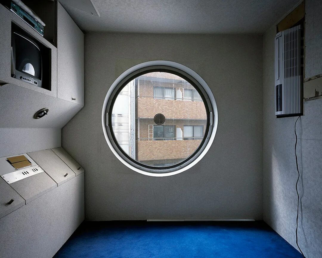 Камера 6 кв метров. Башня капсула Накагин. Капсульная башня Накагин (Токио, Япония). Капсульный дом Накагин Токио внутри. Башня Накагин в Токио внутри.