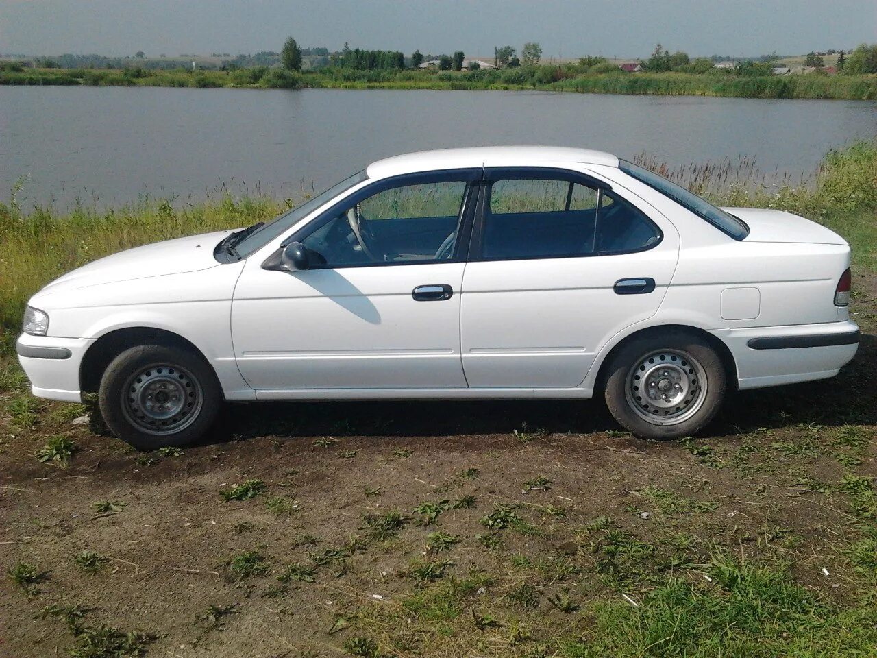 Купить ниссан санни в омске. Ниссан Санни в15. Nissan Sunny 93. Ниссан Санни b15. Ниссан Санни 15 кузов.