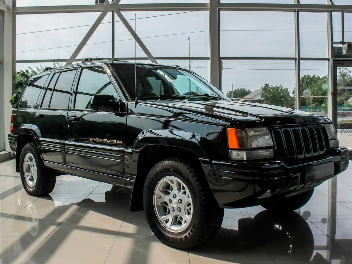 Куплю гранд чероки б у. Jeep Grand Cherokee ZJ 5.2 черный. Jeep Grand Cherokee 1998 5.2. Jeep Grand Cherokee 1997 5.9. Jeep Grand Cherokee 5.2.